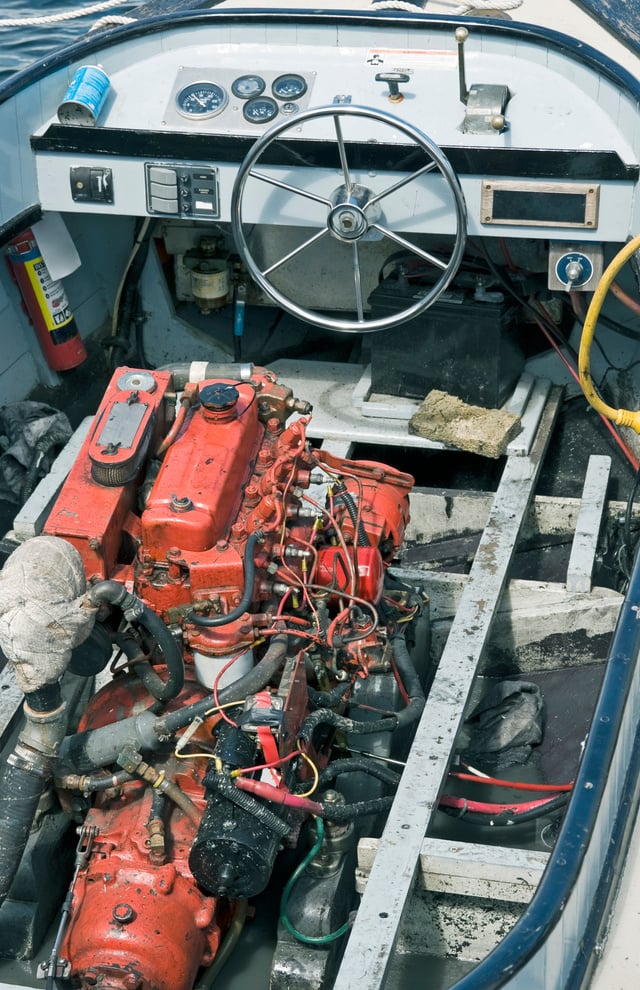 Inboard motor in old wooden boat